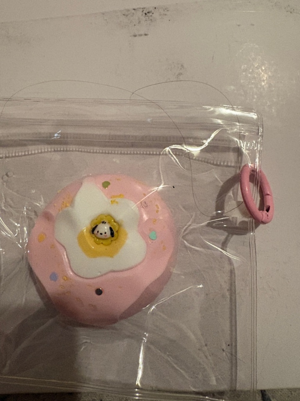 Pink Flower Charm Donut squishy inThe likeness of pochacco